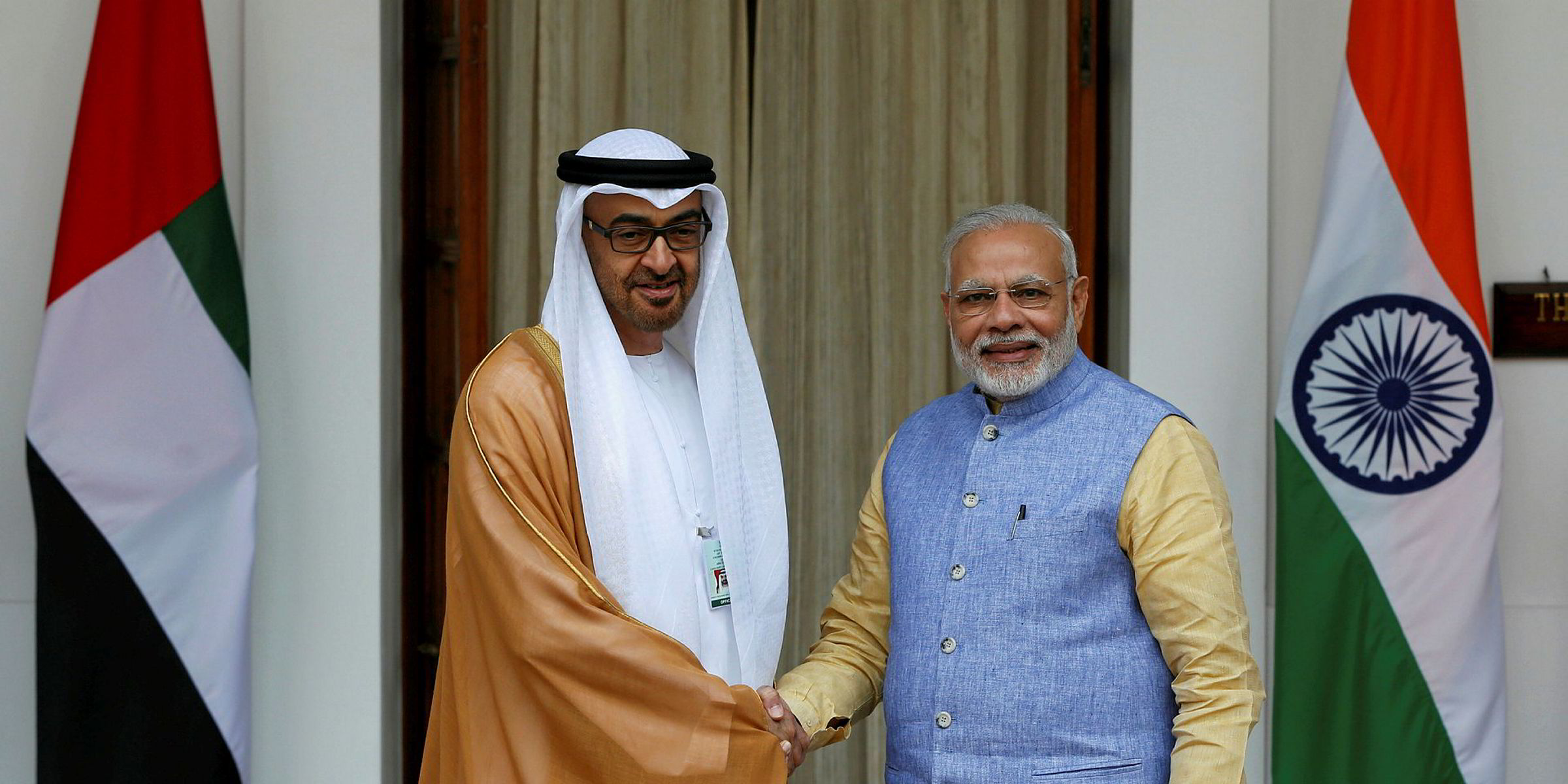 Trade united arab emirates. Sheikh Mohammed Shaking hands. India UAE. Look East Policy. Invest in Emirates.