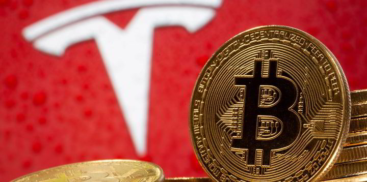 Tesla puts brakes on Bitcoin car sales over currency ...