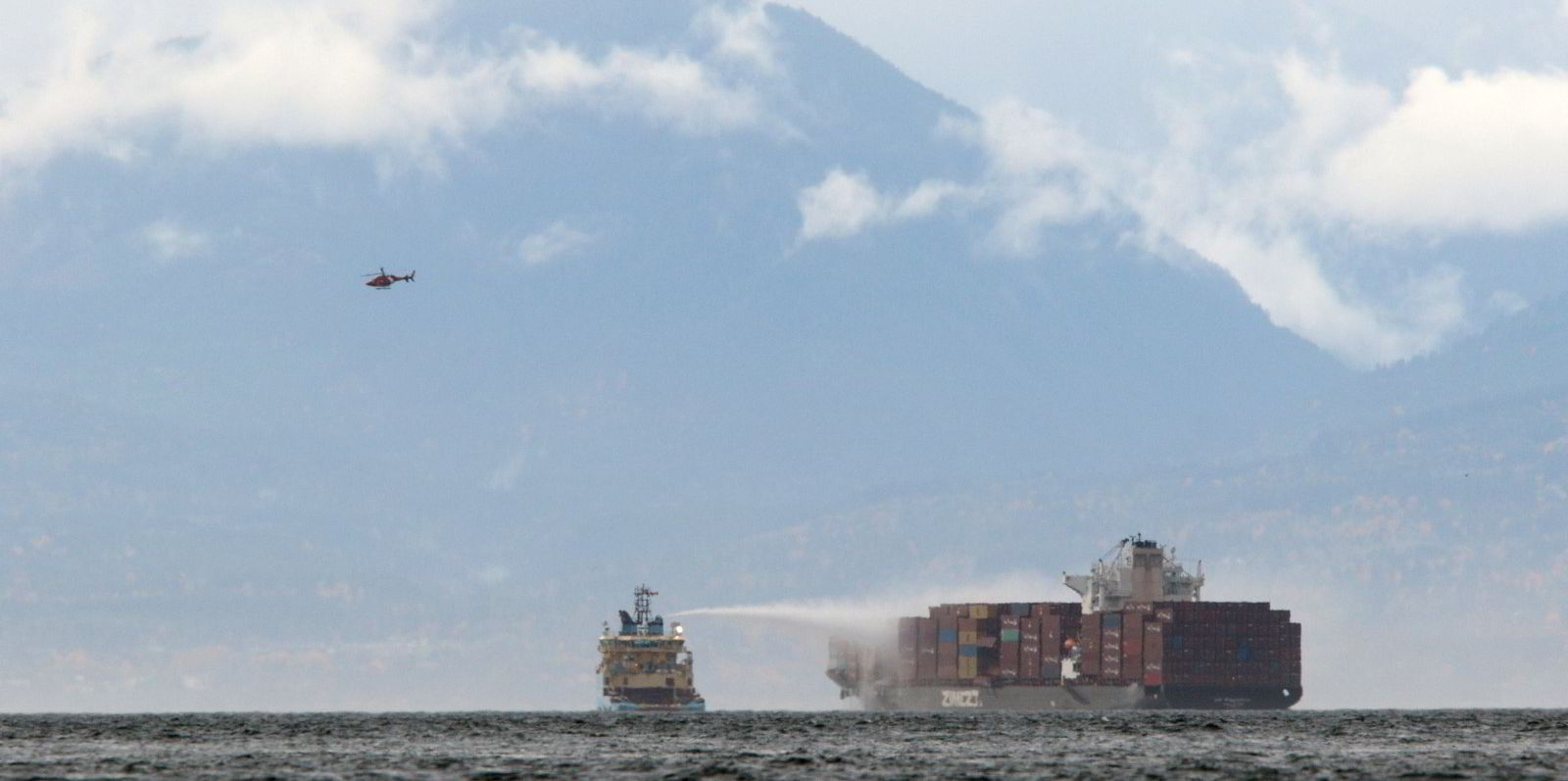 Flames extinguished after container collapse sparks blaze on Zim ship